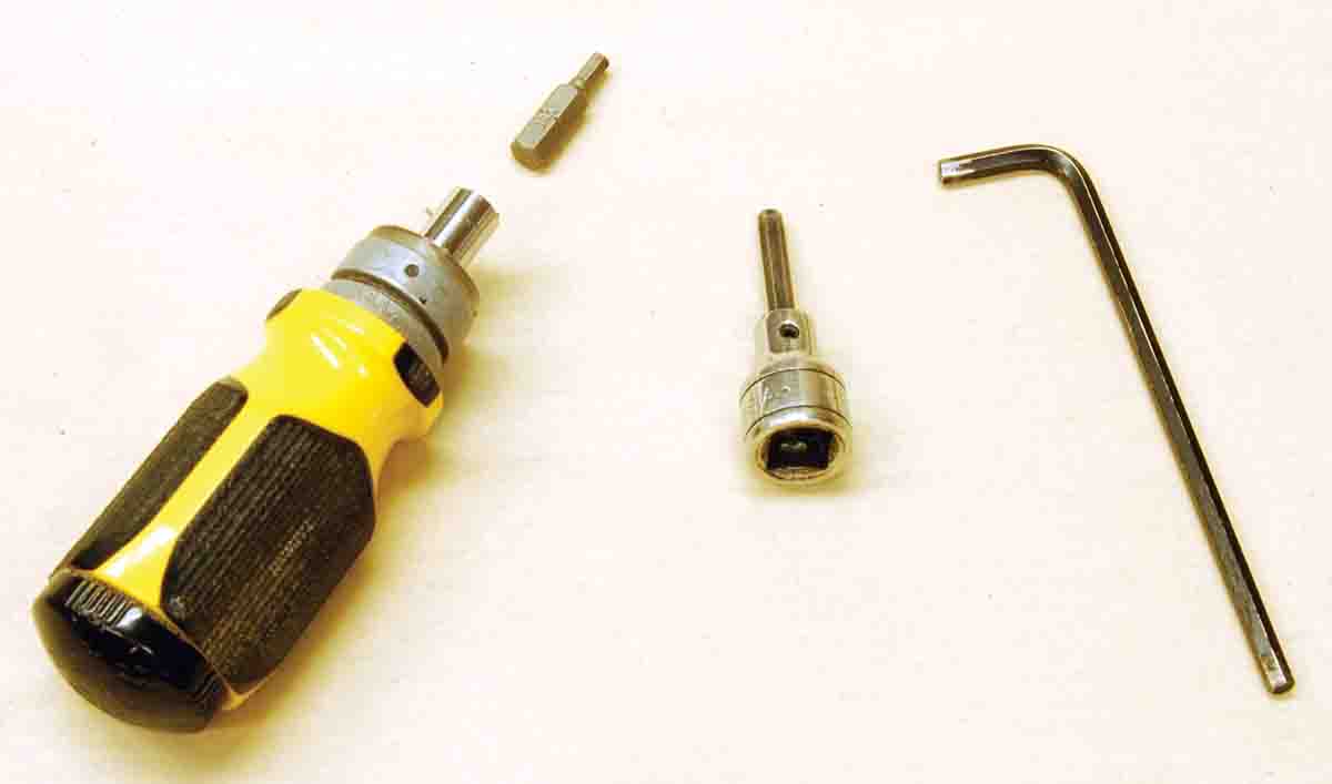 Drivers for socket-head guard screws include (left to right): insert bits for magnetic screwdrivers, heavy duty ratchet wrenches for 3⁄8-inch drives and a common L-shaped Allen wrench.